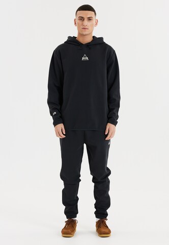 SOS Tapered Trousers 'Vail' in Black