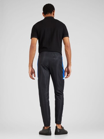 Sergio Tacchini Joggingová súprava 'TEXT' - Čierna
