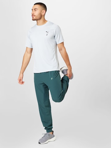 Superdry Ozke Športne hlače | zelena barva