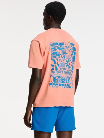 Tricou 'Finn Paradise Block' de la Shiwi pe portocaliu