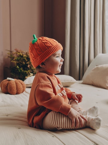 Next - Gorra en naranja