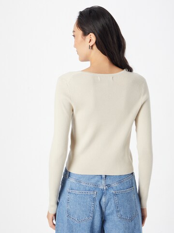 Calvin Klein Jeans Neuletakki värissä beige