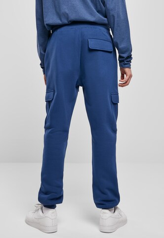 Tapered Pantaloni cargo di Urban Classics in blu
