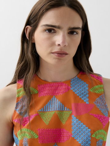 Scalpers Dress in Orange