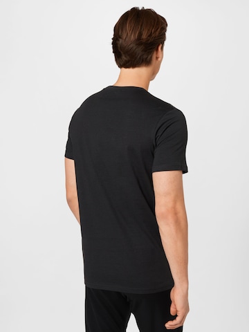 T-Shirt fonctionnel Hummel en noir