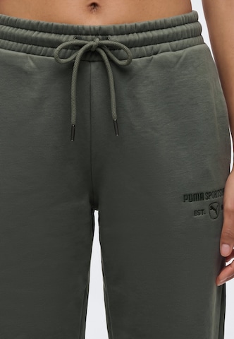 PUMA Štandardný strih Športové nohavice 'Classic' - Zelená