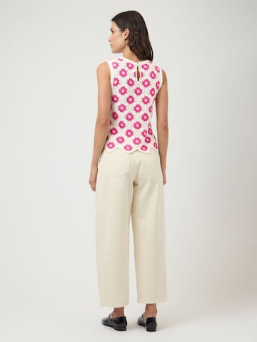 Top di YAS in bianco