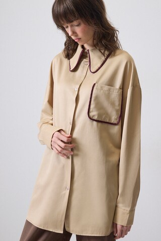 Chemisier Touche Prive en beige