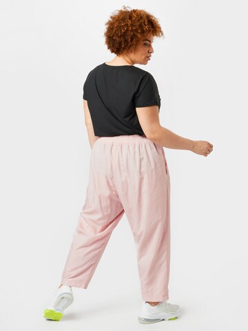 Largi Pantaloni sport de la Nike Sportswear pe roz