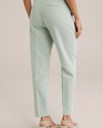 Slimfit Pantaloni con pieghe di WE Fashion in verde