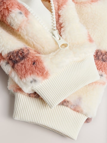 Next Sparkdräkt/body i beige