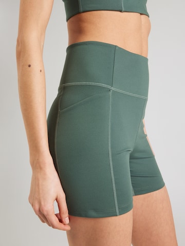 Girlfriend Collective Skinny Sportovní kalhoty – zelená