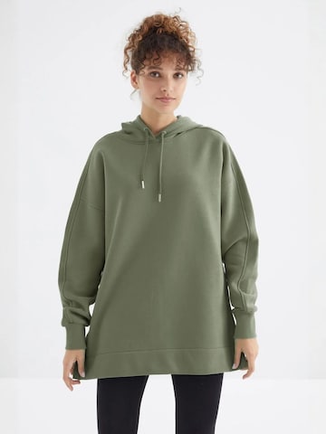 Sweat-shirt Tommy Life en vert : devant