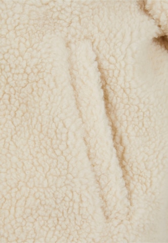 Karl Kani Tussenjas in Beige