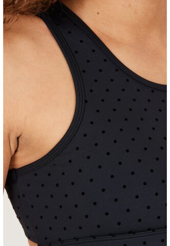 Athlecia Medium Support Sport-BH 'Tiya' in Schwarz