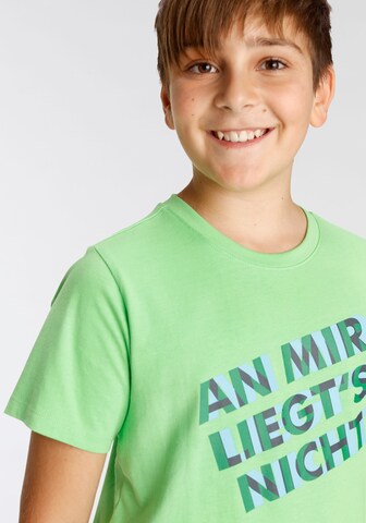 ABOUT YOU Kidsworld T-Shirt Dunkelgrün | Hellgrün, in