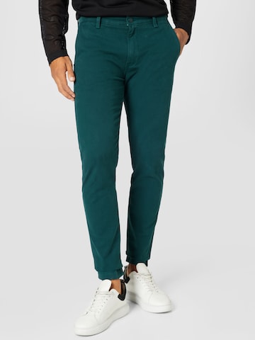 LEVI'S ® Slim fit Chino trousers 'XX Chino Slim Tapered' in Green: front
