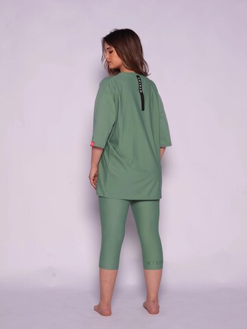 MYKINY BRAND High neck Swimsuit 'Majda semi-burkini Pistache Green' in Green