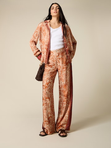 oltre Baggy Trousers in Orange