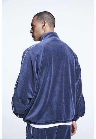 Karl Kani - Chaqueta de chándal en azul