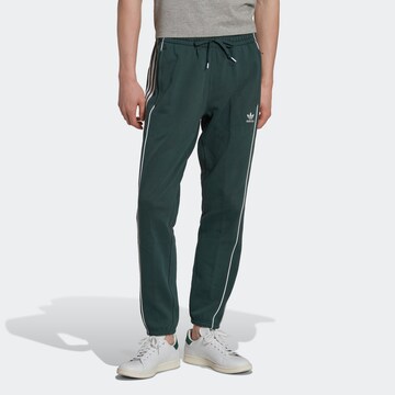 ADIDAS ORIGINALS Конический (Tapered) Штаны 'Rekive' в Зеленый: спереди