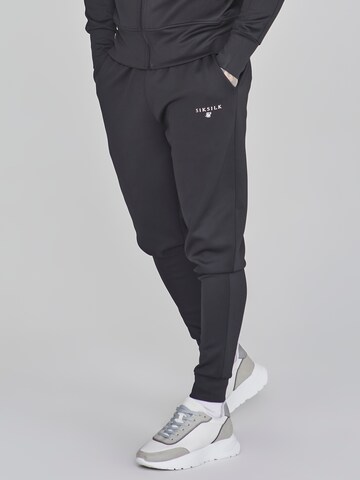 Effilé Pantalon SikSilk en noir : devant