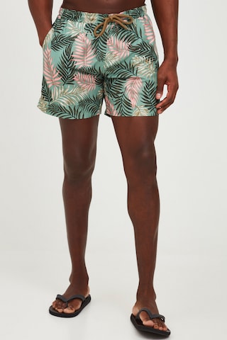 !Solid Board Shorts in Green: front