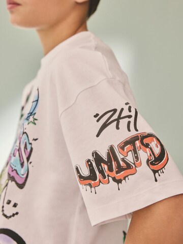 T-Shirt Next en blanc