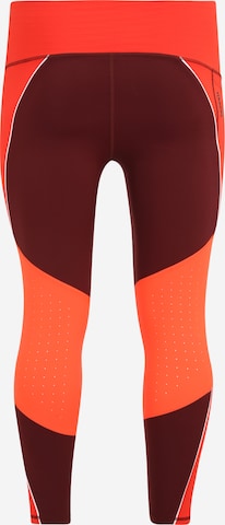 UNDER ARMOUR Skinny Športne hlače 'Rush' | rdeča barva