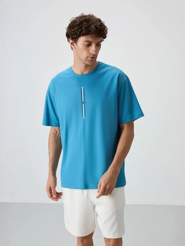 T-Shirt Tommy Life en bleu : devant