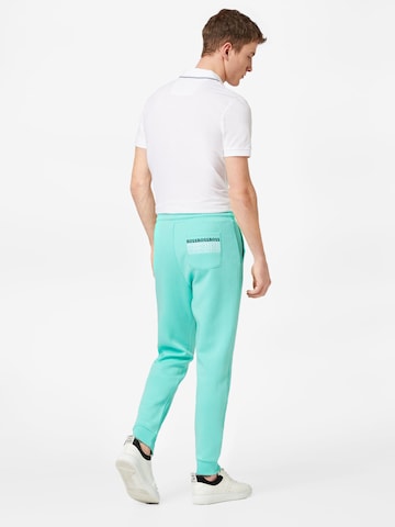 Tapered Pantaloni 'Hadiko 1' di BOSS Green in verde