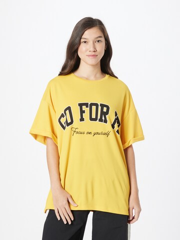 Koton Μπλουζάκι σε κίτρινο: μπροστά