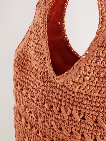 Next Shopper in Orange