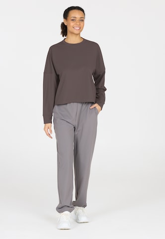 Athlecia Sports sweatshirt in Purple