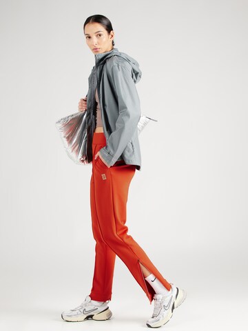 Tapered Pantaloni sportivi 'Heritage' di NIKE in marrone