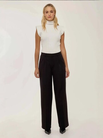 Loosefit Pantaloni con pieghe di Hiccup in nero
