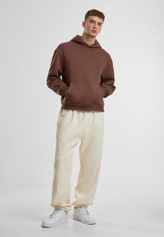 Tapered Pantaloni di Urban Classics in beige
