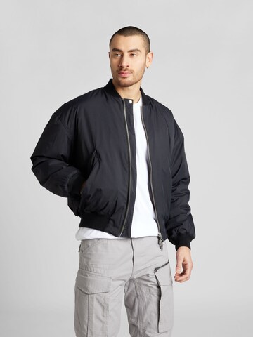 Embassy of Bricks and Logs Between-season jacket 'Santa Fe' in Black: front