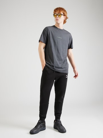 QUIKSILVER - Camiseta funcional 'PEACE PHASE' en negro