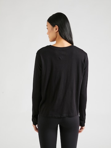 DKNY Performance - Camiseta funcional en negro