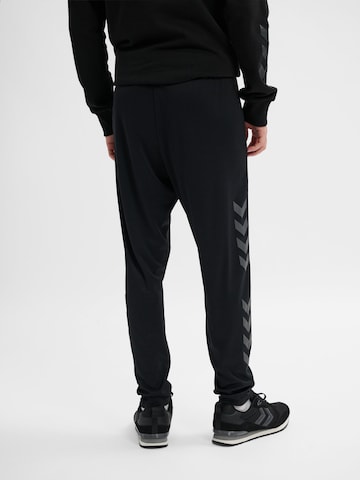 Regular Pantalon de sport Hummel en noir