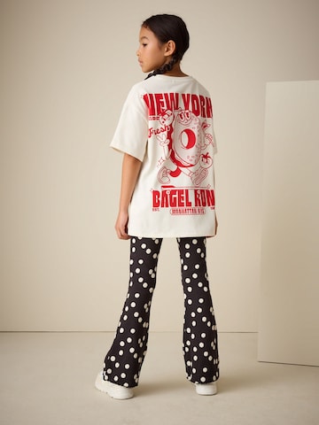 melns Next Plati gali Bikses