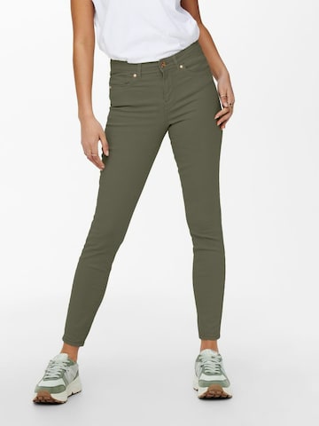 Skinny Jeans 'WAUW' di ONLY in verde