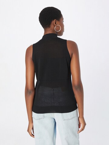 Pull-over Sisley en noir