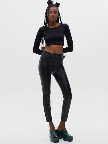 Skinny Pantaloni de la Pull&Bear pe negru: față