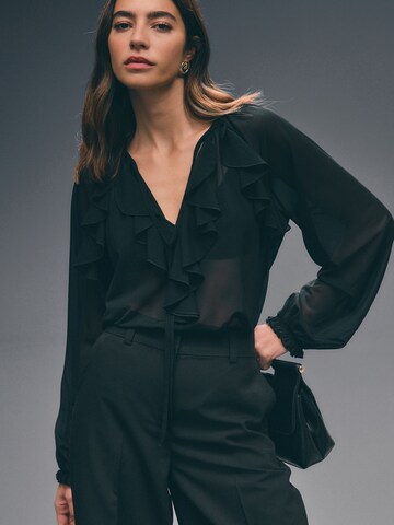 Next - Blusa en negro: frente