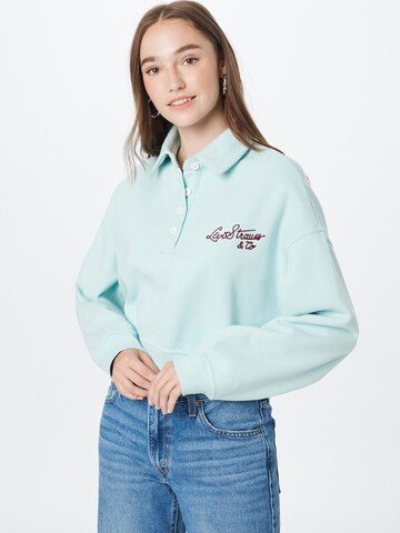 LEVI'S ®Sweater majica 'Graphic Cropped Stevie' - plava boja: prednji dio