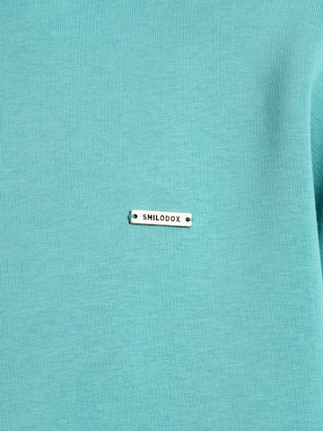 Veste de survêtement Smilodox en bleu
