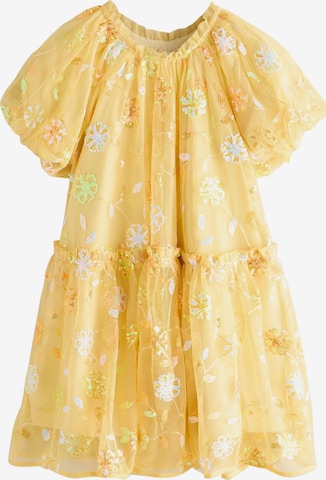 Next Mekko värissä keltainen: etupuoli