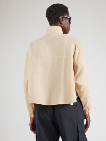 Nike Sportswear Between-season jacket in Beige